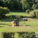 Trampoline, Swings, Slide, and Tractor 